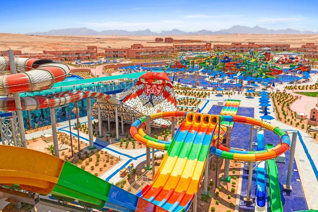 a water park with a roller coaster at Pickalbatros Jungle Aqua Park - Neverland Hurghada in Hurghada