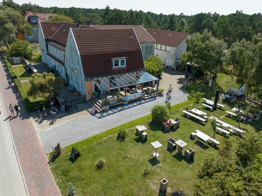 an overhead view of a building with a restaurant at Hotel 'Das Strandhaus' in Böhl
