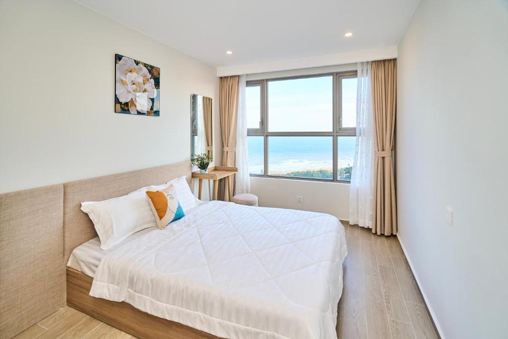 En eller flere senge i et værelse på The sóng Remy Apartment