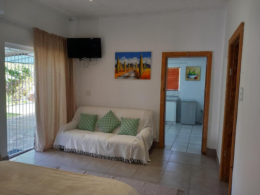 Postel nebo postele na pokoji v ubytování 7 On Grey Guesthouse