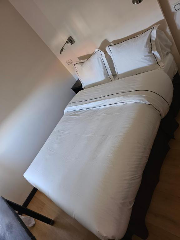 Postel nebo postele na pokoji v ubytování hotel asador versus