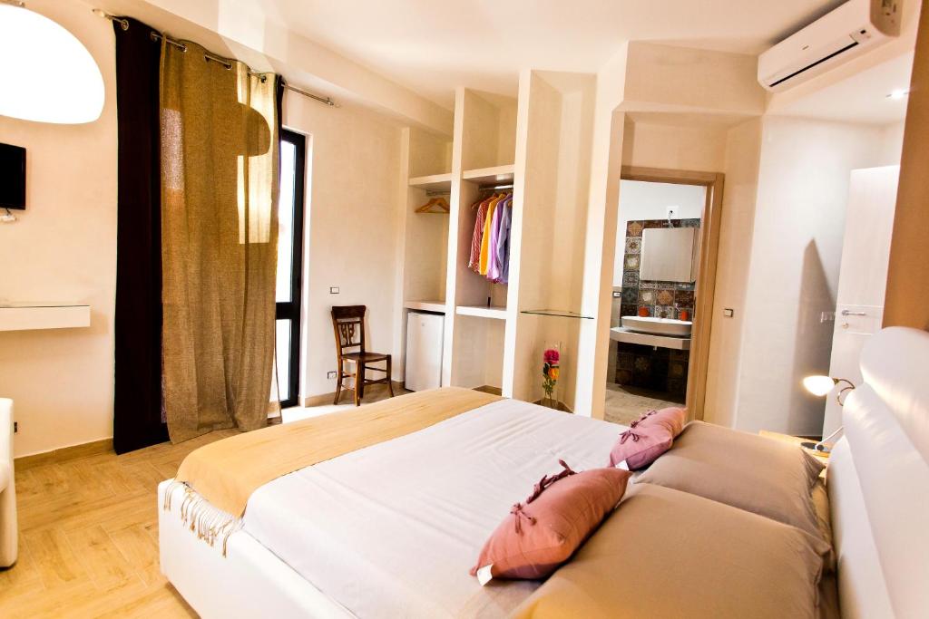 Postel nebo postele na pokoji v ubytování B&B Shining
