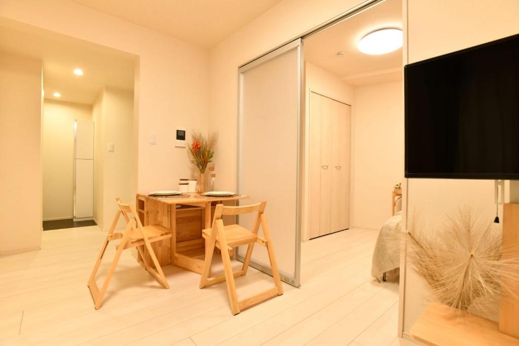 TV a/nebo společenská místnost v ubytování FL Residence Shinjuku II