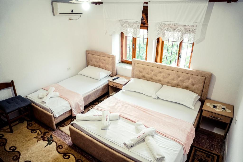 Postel nebo postele na pokoji v ubytování Guesthouse Arber