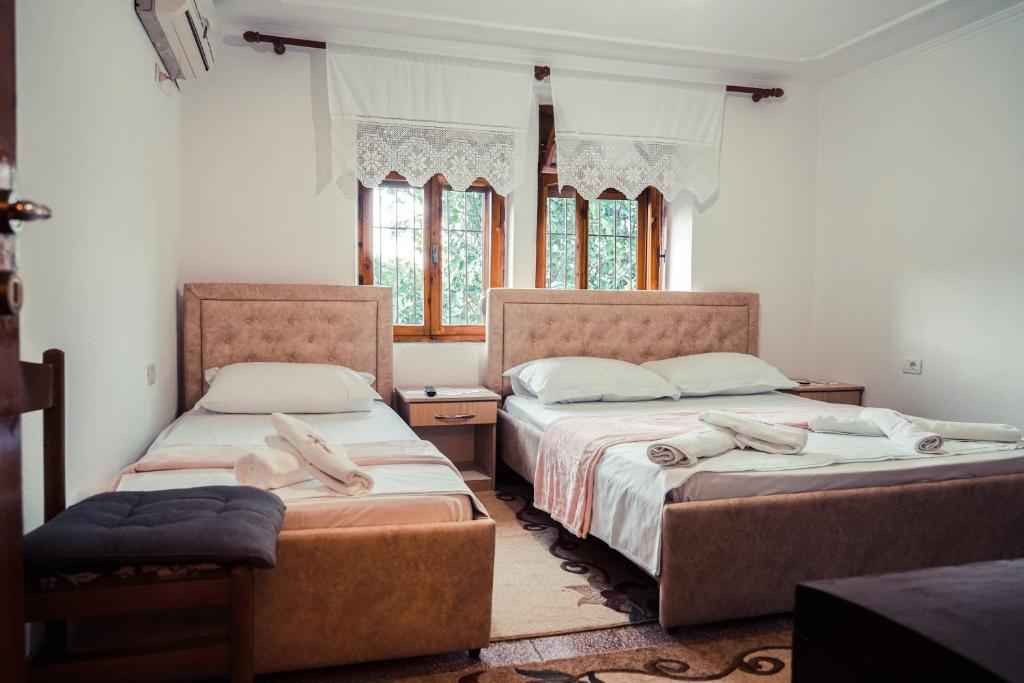 Postel nebo postele na pokoji v ubytování Guesthouse Arber