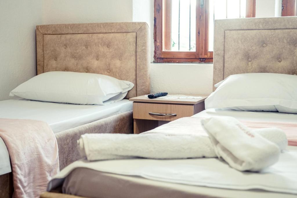 Postel nebo postele na pokoji v ubytování Guesthouse Arber
