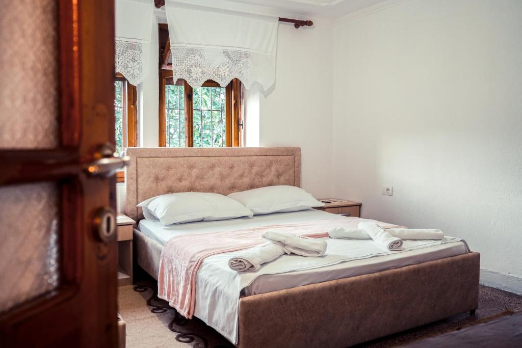 Postel nebo postele na pokoji v ubytování Guesthouse Arber