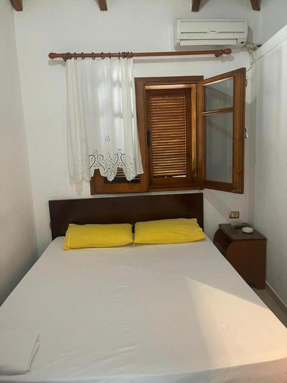 Postel nebo postele na pokoji v ubytování Guest House Kocollari