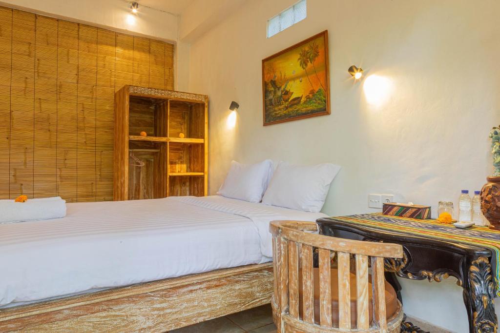 Postel nebo postele na pokoji v ubytování Shankara Accomodation Ubud
