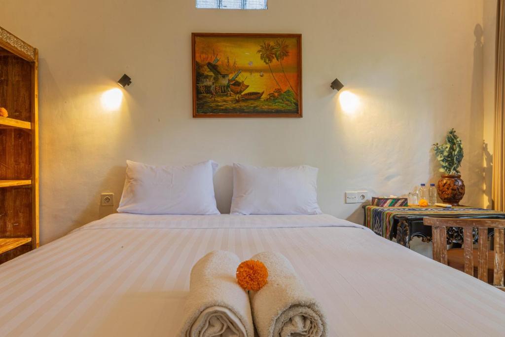 Postel nebo postele na pokoji v ubytování Shankara Accomodation Ubud