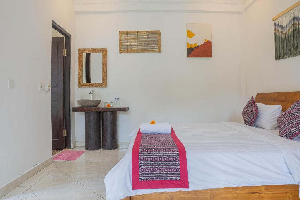 Postel nebo postele na pokoji v ubytování Shankara Accomodation Ubud