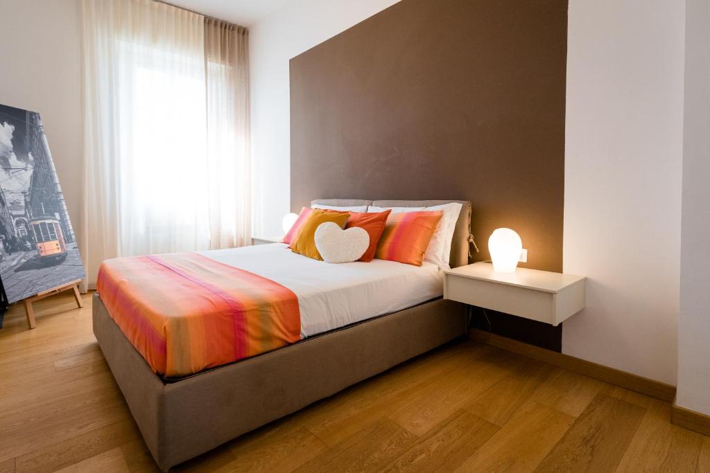 Ένα ή περισσότερα κρεβάτια σε δωμάτιο στο Romolo Space - Navigli