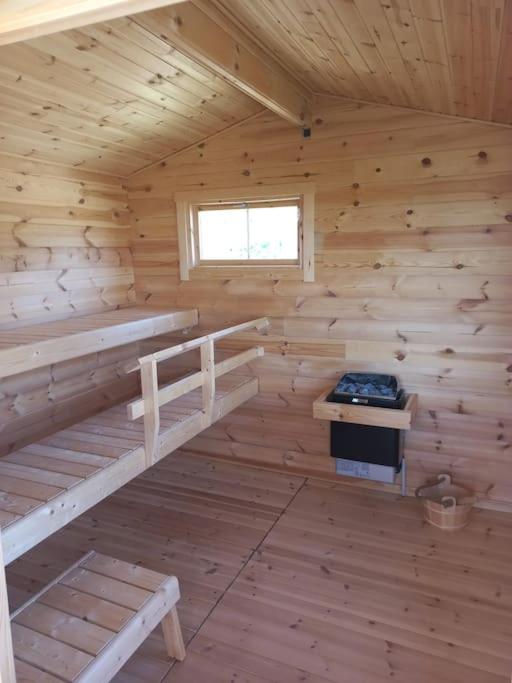 Palanda nebo palandy na pokoji v ubytování Vue exceptionnelle et sauna à 1h de Toulouse.