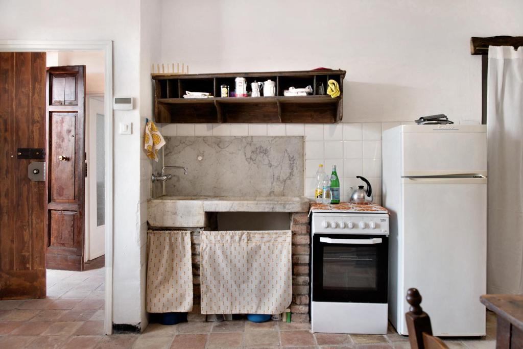Kuchyň nebo kuchyňský kout v ubytování Casa Cigana