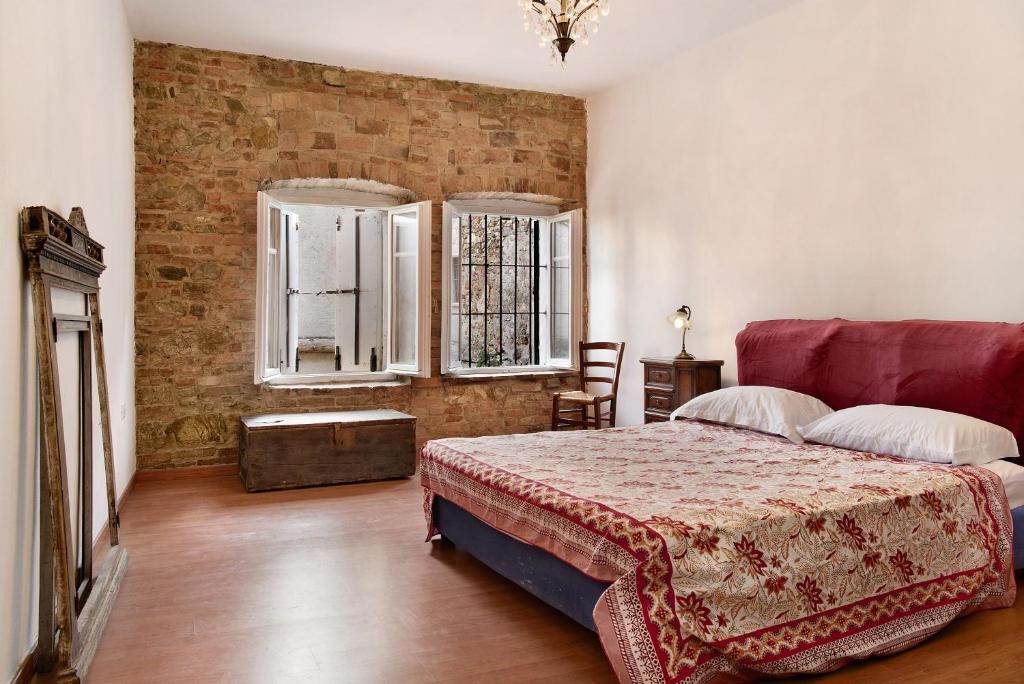 Postel nebo postele na pokoji v ubytování Casa Cigana