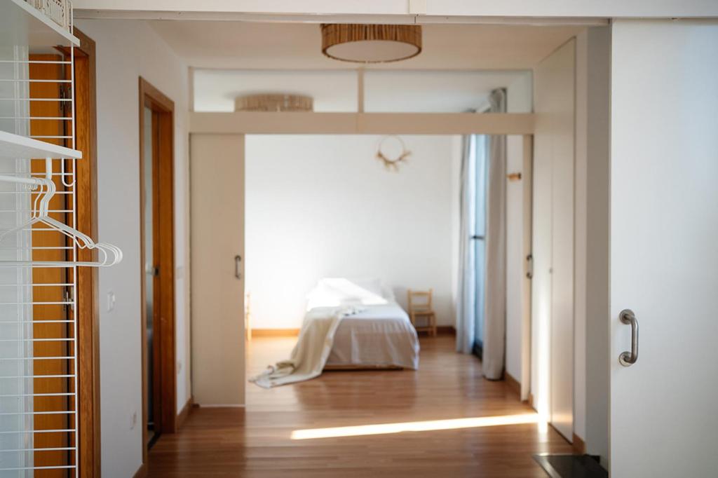 Postel nebo postele na pokoji v ubytování Casa2patis
