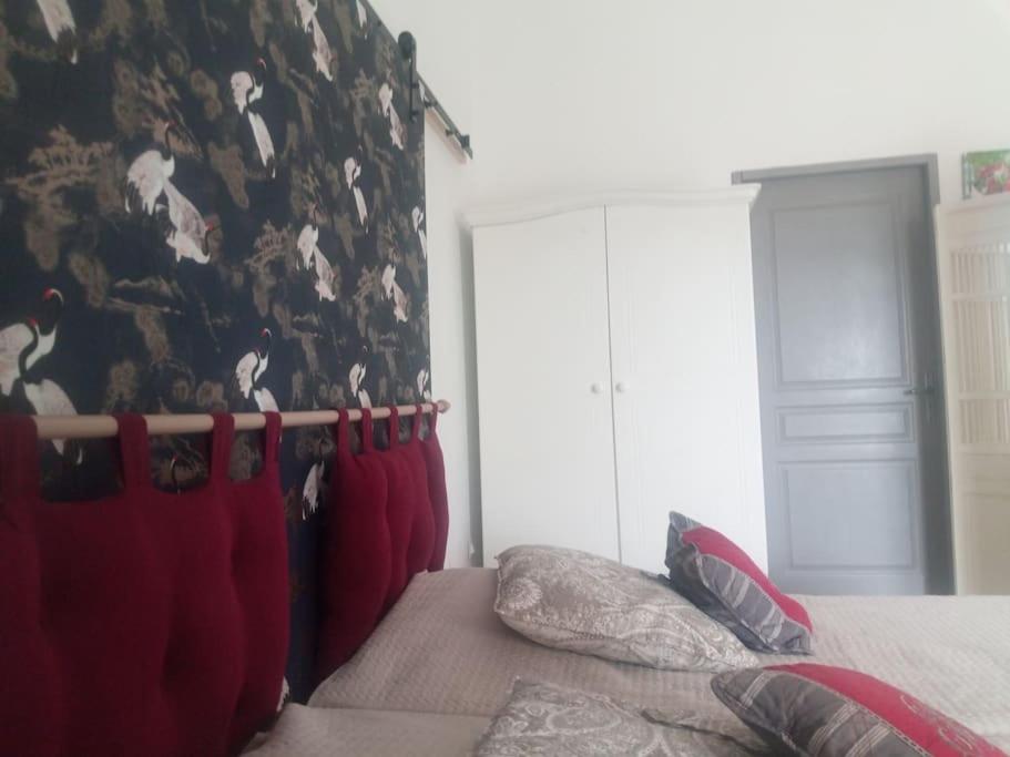 Postel nebo postele na pokoji v ubytování Gite LE PETIT LUBERON COQUELICOT