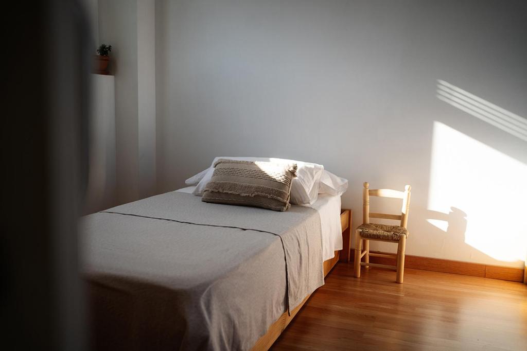 Postel nebo postele na pokoji v ubytování Casa2patis