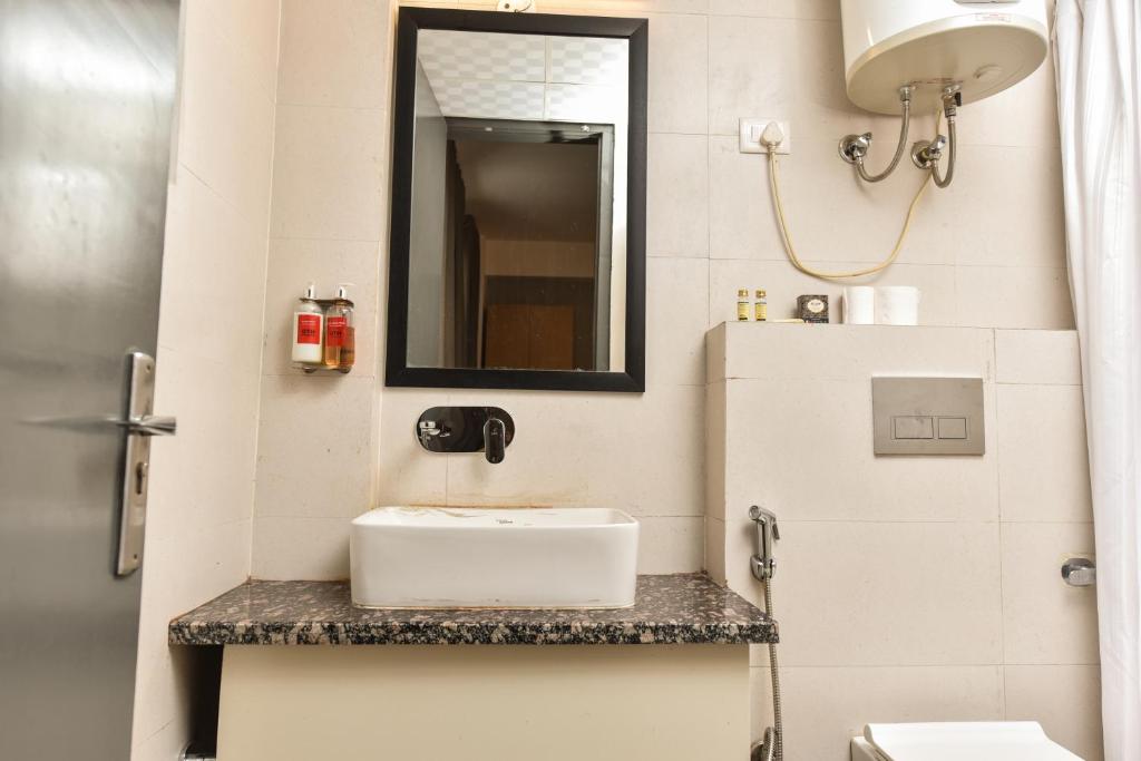 Koupelna v ubytování Hotel A4U sector 45 Gurgaon