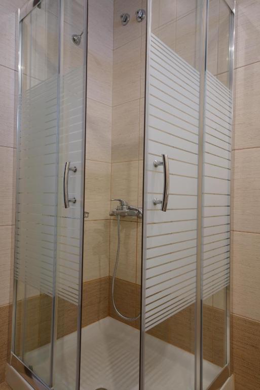 Koupelna v ubytování Hotel Olympion