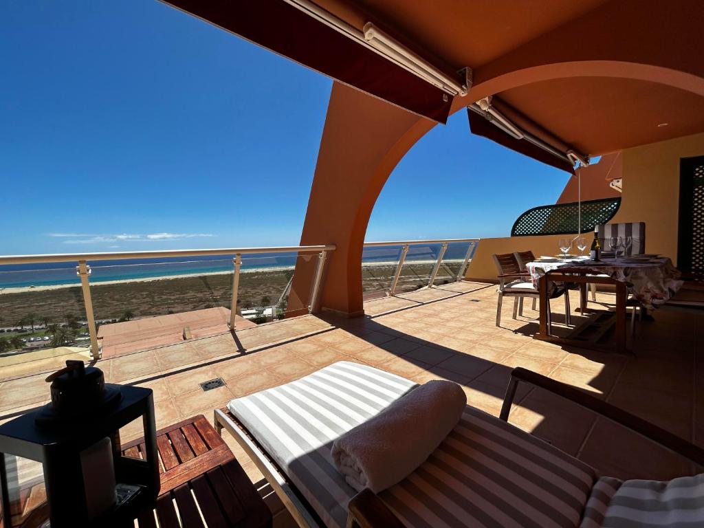 a large balcony with a view of the ocean at Terrazas de Jandía in Morro del Jable