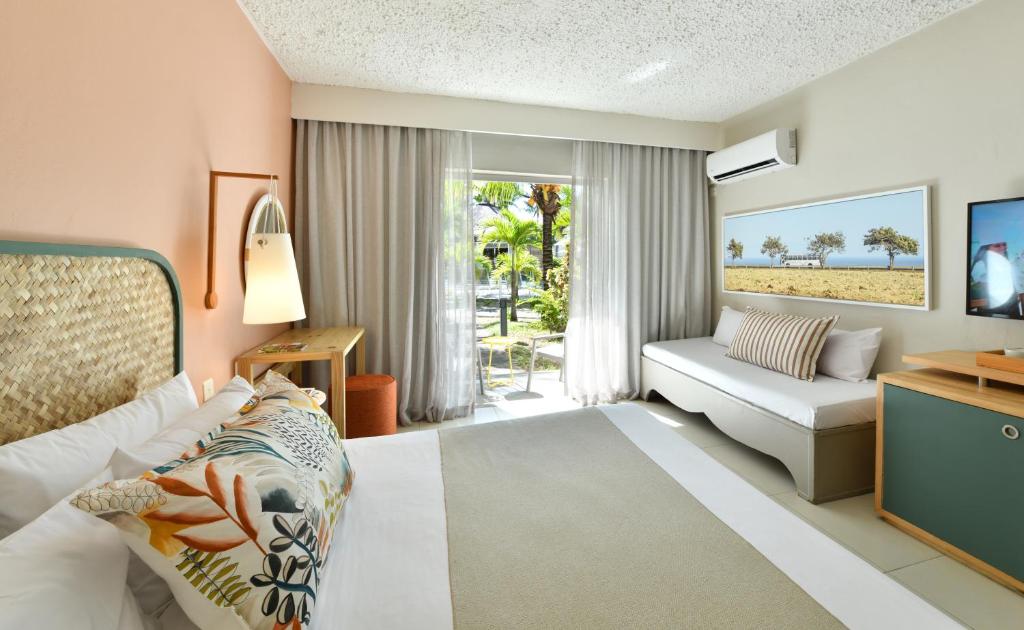 TV a/nebo společenská místnost v ubytování Veranda Palmar Beach Hotel & Spa - All Inclusive