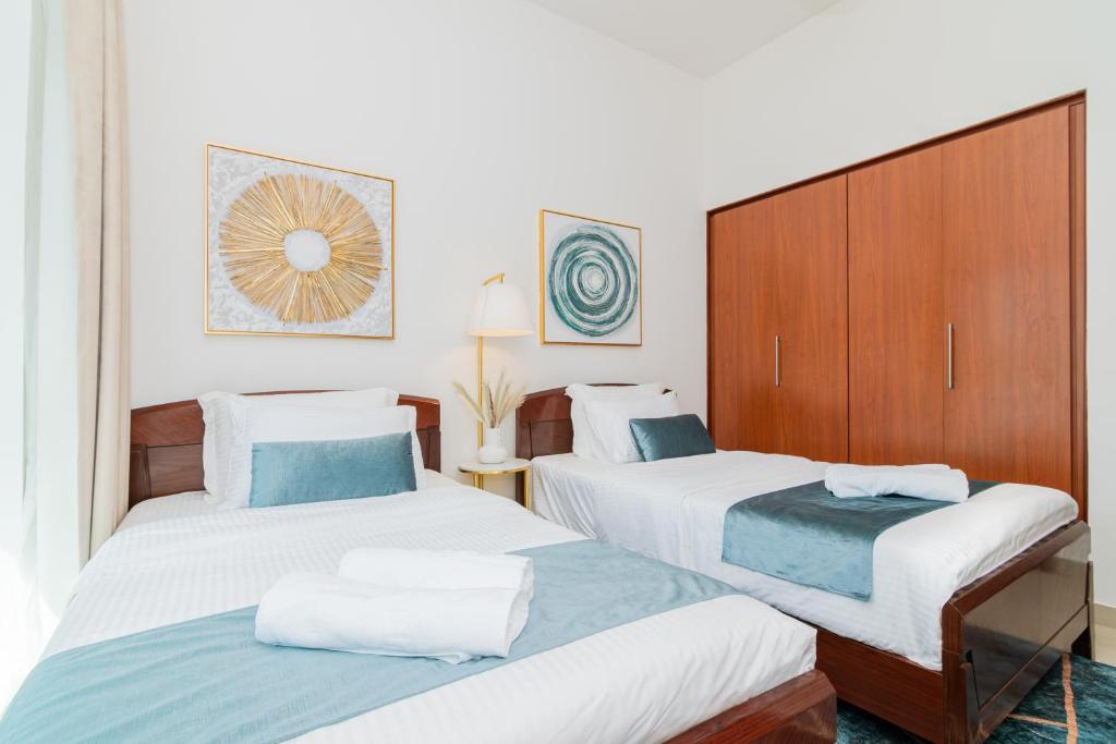Postel nebo postele na pokoji v ubytování Dubai Marina,JBR -Luxurious 2 BR King Suite