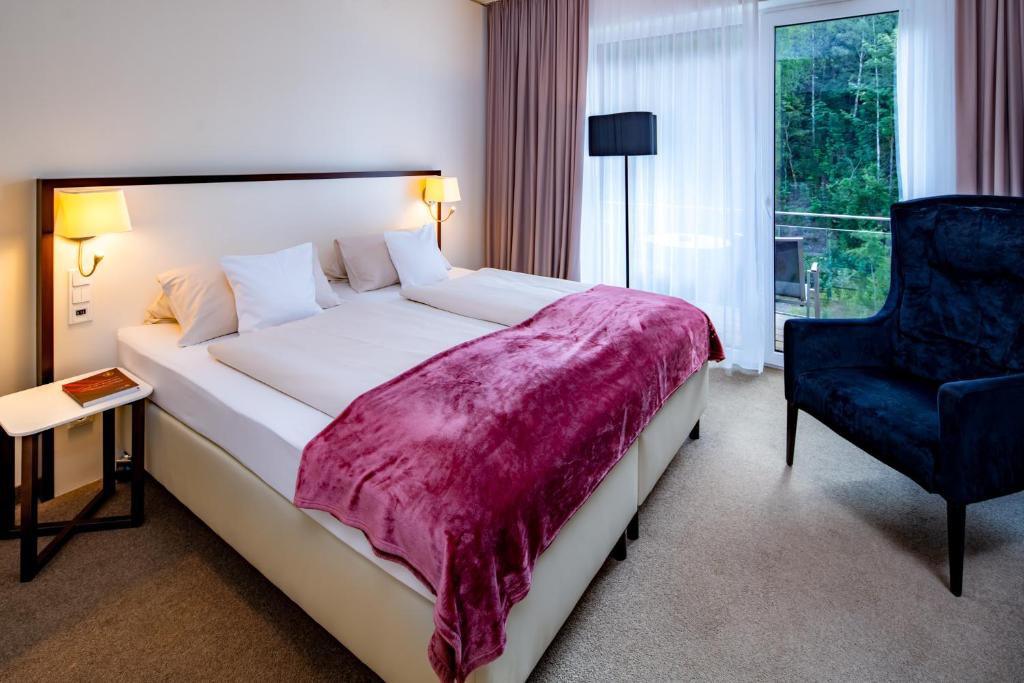 Postel nebo postele na pokoji v ubytování Hotel König Albert