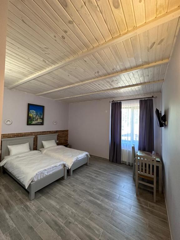 Postel nebo postele na pokoji v ubytování Maestro