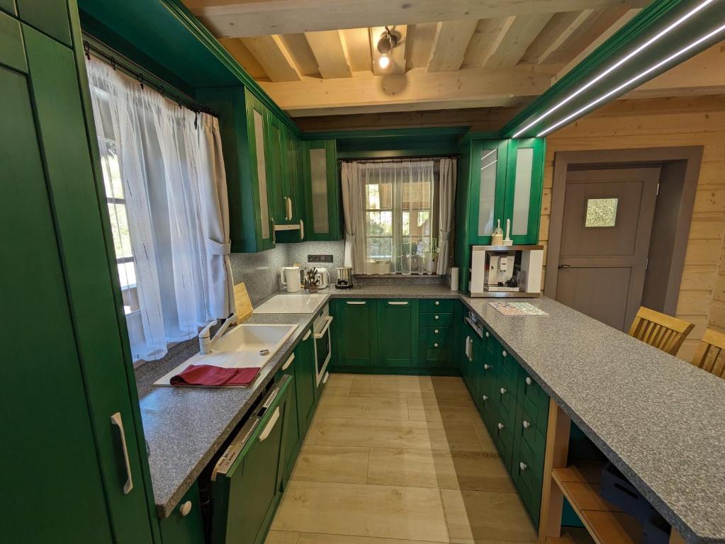 Kuchyň nebo kuchyňský kout v ubytování Wellness Chalet Kohútka