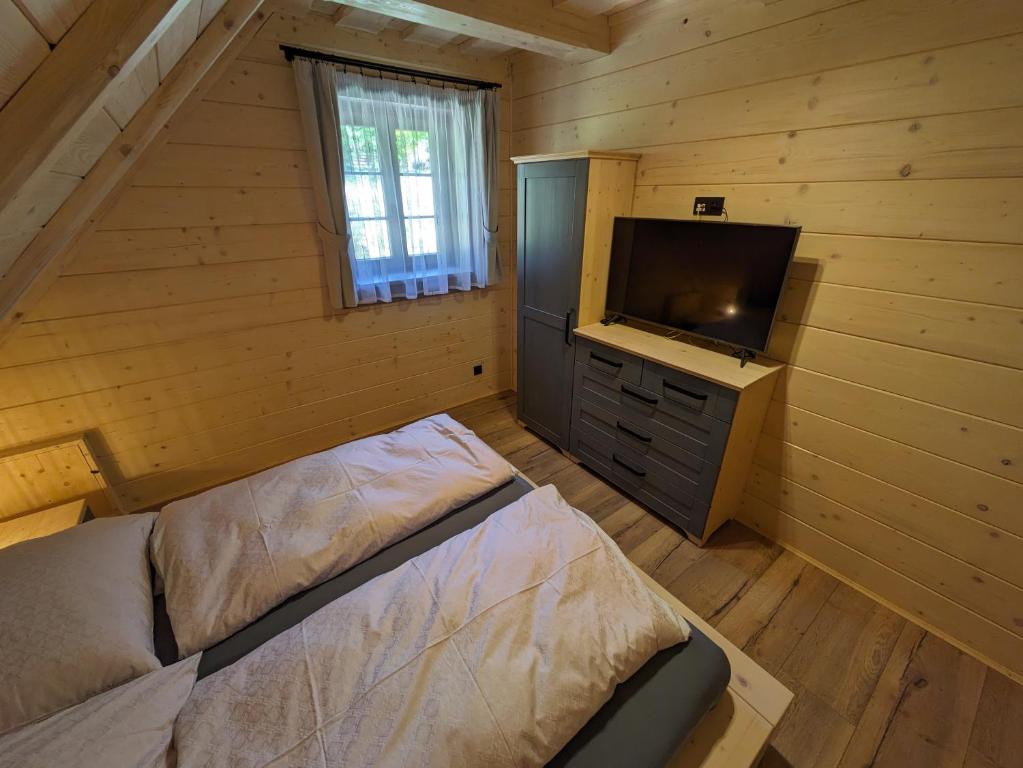 Postel nebo postele na pokoji v ubytování Wellness Chalet Kohútka