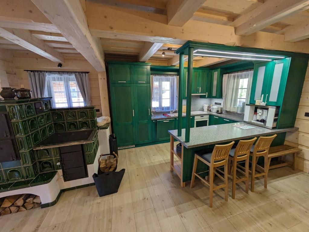 Kuchyň nebo kuchyňský kout v ubytování Wellness Chalet Kohútka