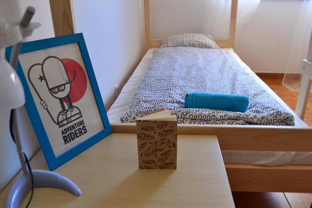 Postel nebo postele na pokoji v ubytování Surf House Peniche