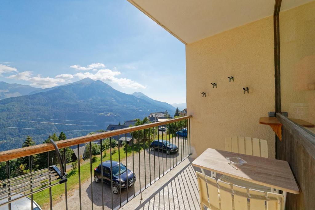 a balcony with a view of a mountain at Le Panorama Orcières - Appt vue montagne in Orcières