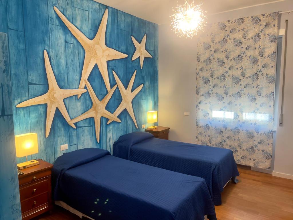 Postel nebo postele na pokoji v ubytování SOGNI sul MARE-5 TERRE JRE