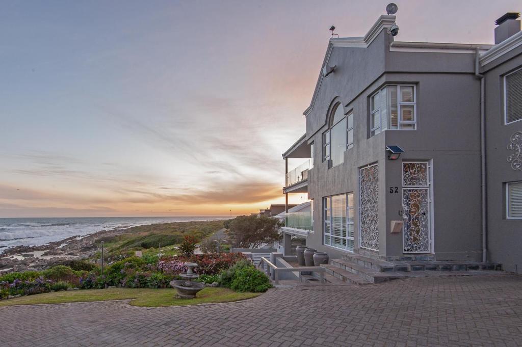 a house with a view of the ocean at Absolute Ocean Boutique Guesthouse in Hermanus