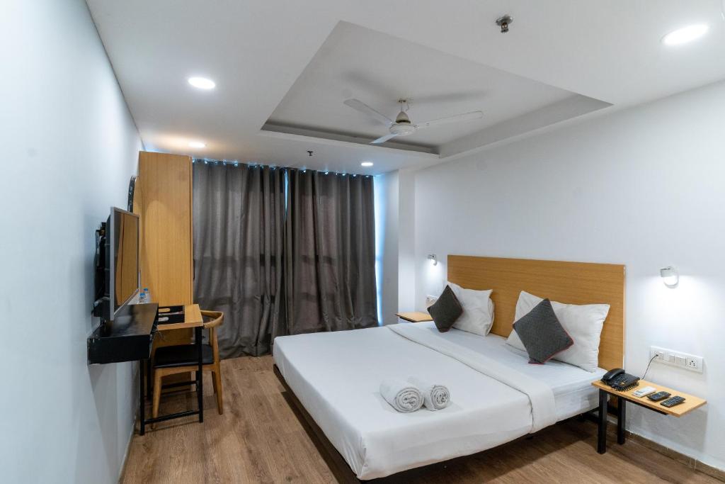 Postel nebo postele na pokoji v ubytování Hotel Sunflare