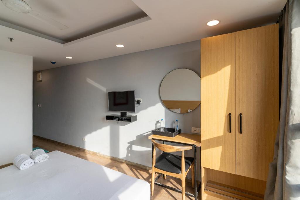 Postel nebo postele na pokoji v ubytování Hotel Sunflare
