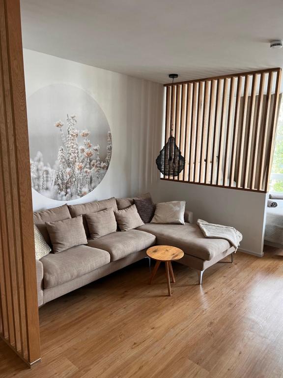 Uma área de estar em Ruhiges Designer Apartment in Zentrum & Rheinnähe
