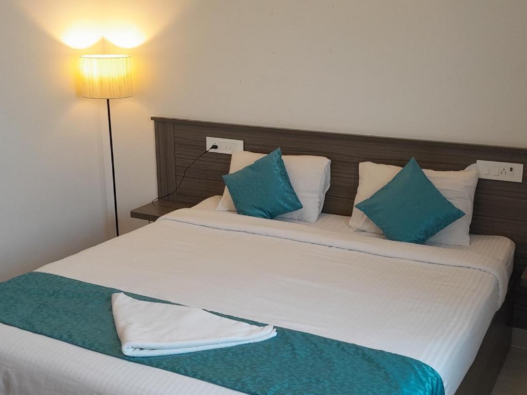 Postel nebo postele na pokoji v ubytování Le Poshe Beachview - TIE Hotels & Resorts
