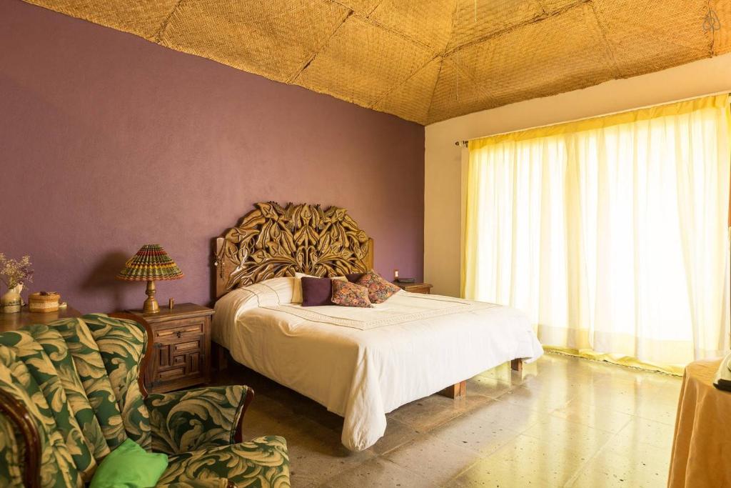 Postel nebo postele na pokoji v ubytování Casa La Columna