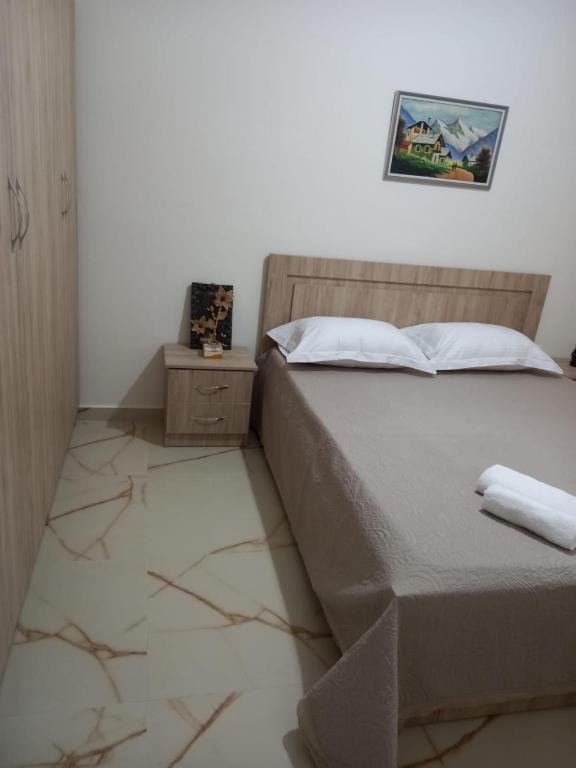Letto o letti in una camera di Vlora 3D Guesthouse