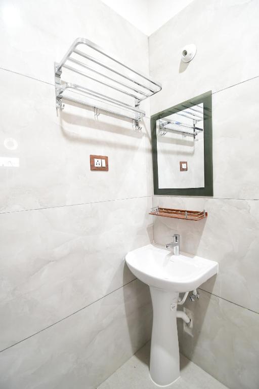 Koupelna v ubytování HOTEL SUSHREE INTERNATIONAL