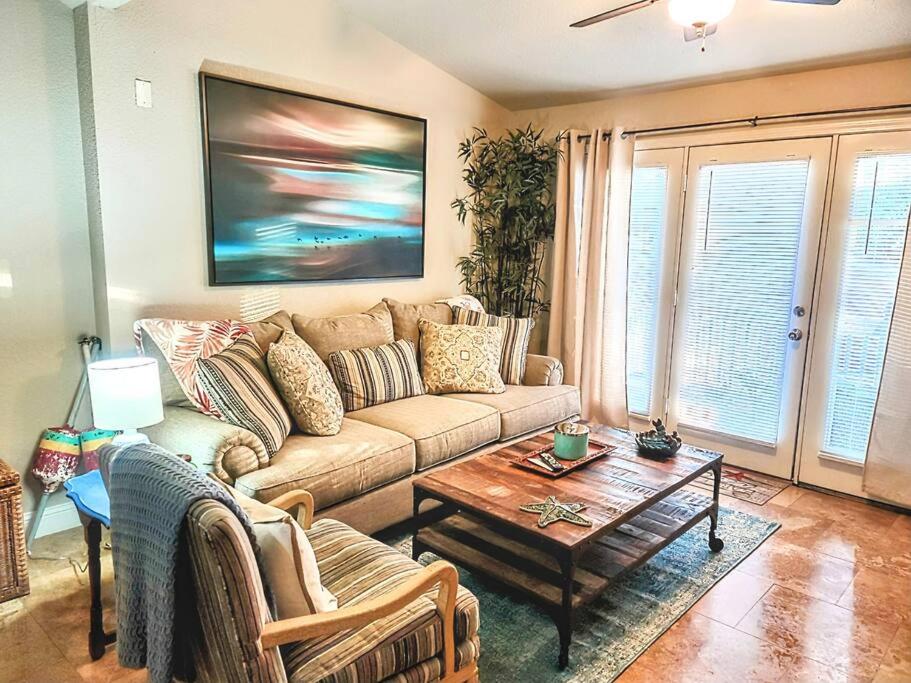 a living room with a couch and a coffee table at Escape to Clearwater - Couples or families in Hot Springs