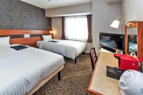 Postel nebo postele na pokoji v ubytování Hotel Mark-1 CNT