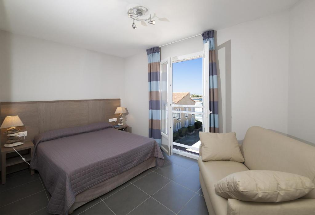 Postel nebo postele na pokoji v ubytování Hotel St Joseph
