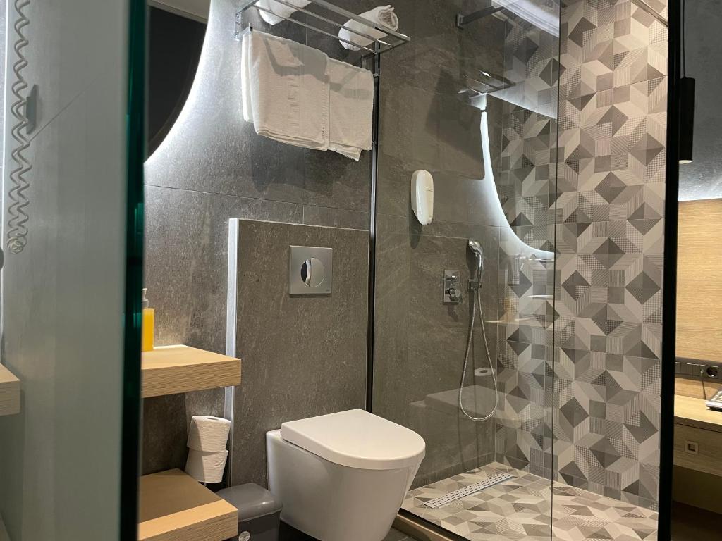 Koupelna v ubytování Voula Hotel