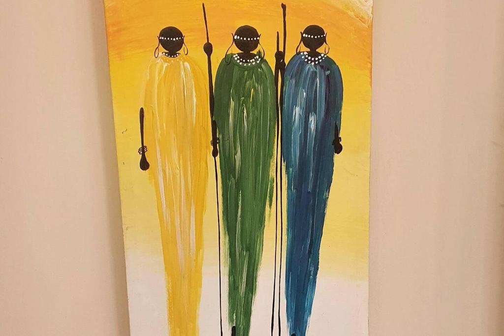 a painting of three people with umbrellas at Gorgeous 1-Bed apartment in Harare in Harare