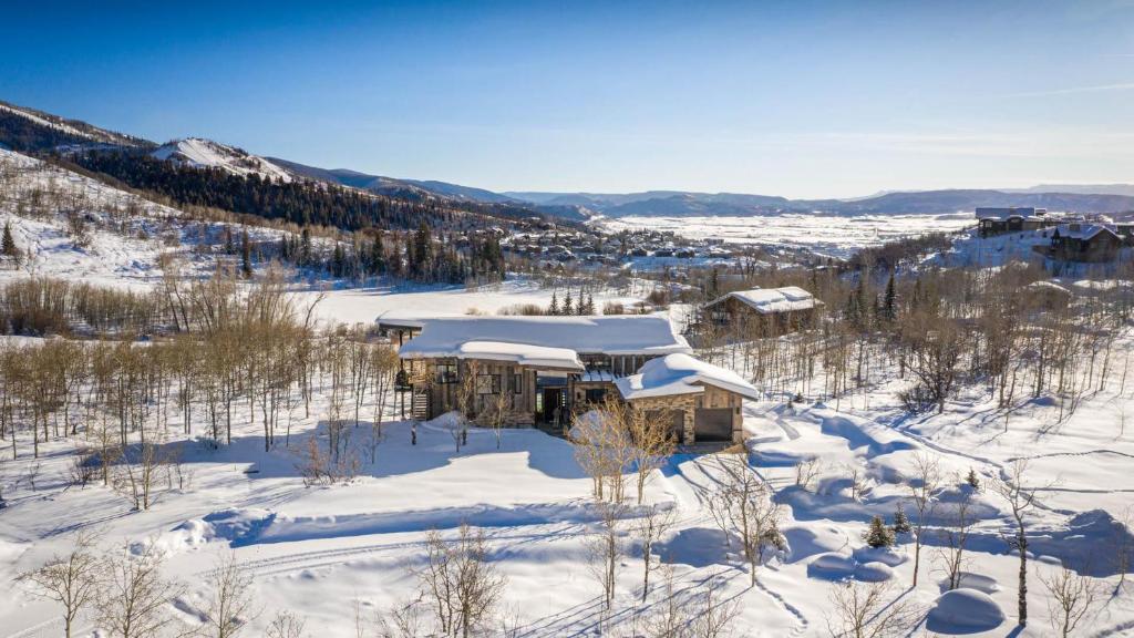 an aerial view of a house in the snow at Chalet Cascada in Steamboat Springs