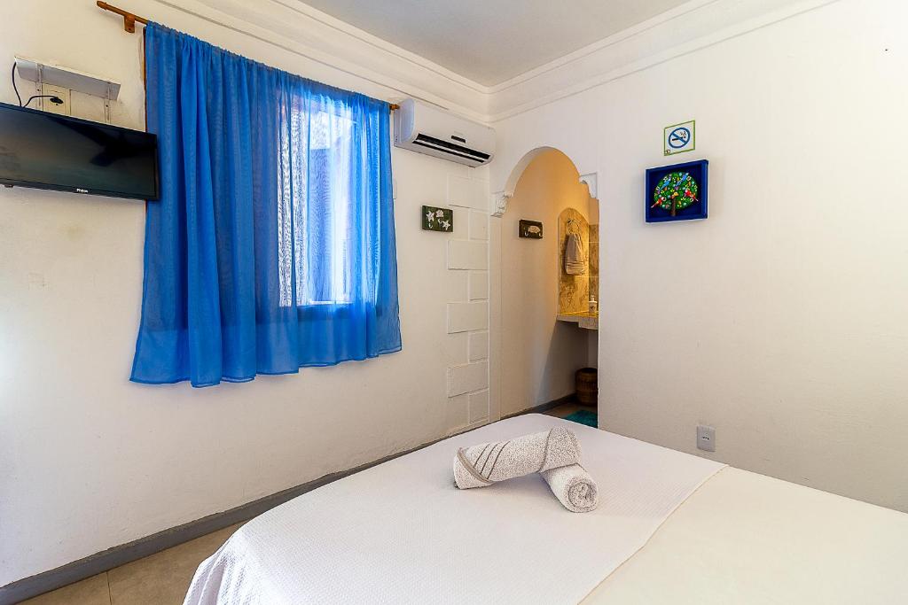 Postel nebo postele na pokoji v ubytování Na Casa 11 - Pousada e Hostel